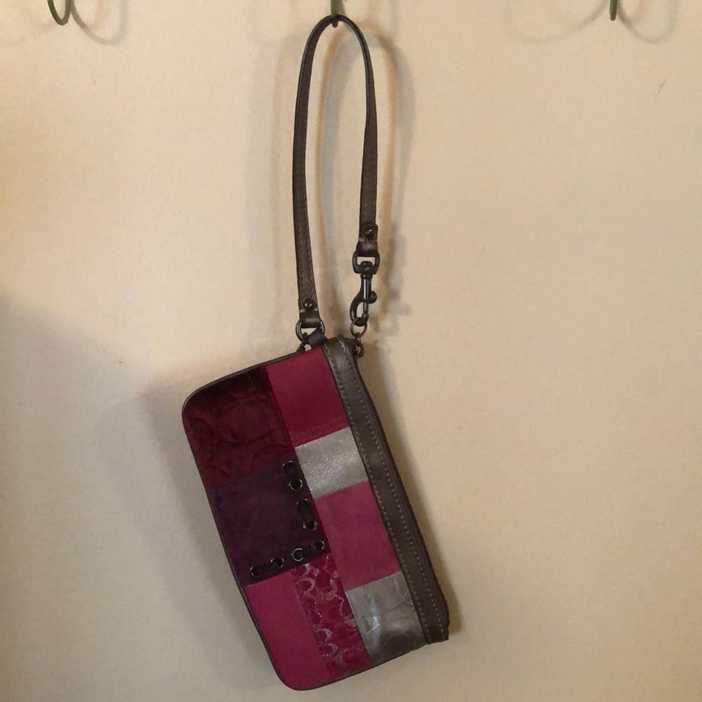 lightly worn multi pink coach wristlet